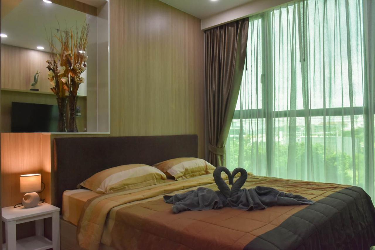 Dusit Grand Condo View Джомтьен Номер фото