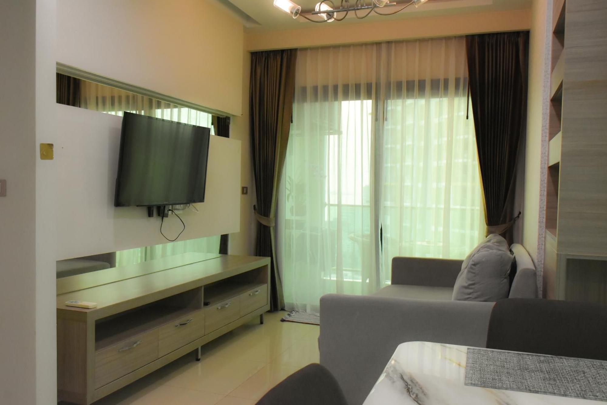 Dusit Grand Condo View Джомтьен Номер фото